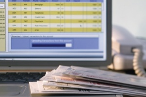 computer with a bank account and checks