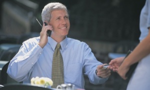 happy man on his cell phone