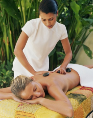 woman giving a client a back massage