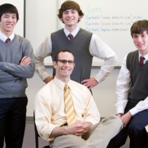 teacher and three students